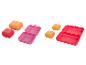 Farbige Lunchboxen: groß und klein, rosa, orange und rot.