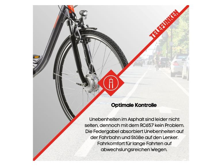 Fahrrad-Vorderrad mit Federgabel für optimale Kontrolle und Komfort auf unebenen Wegen.