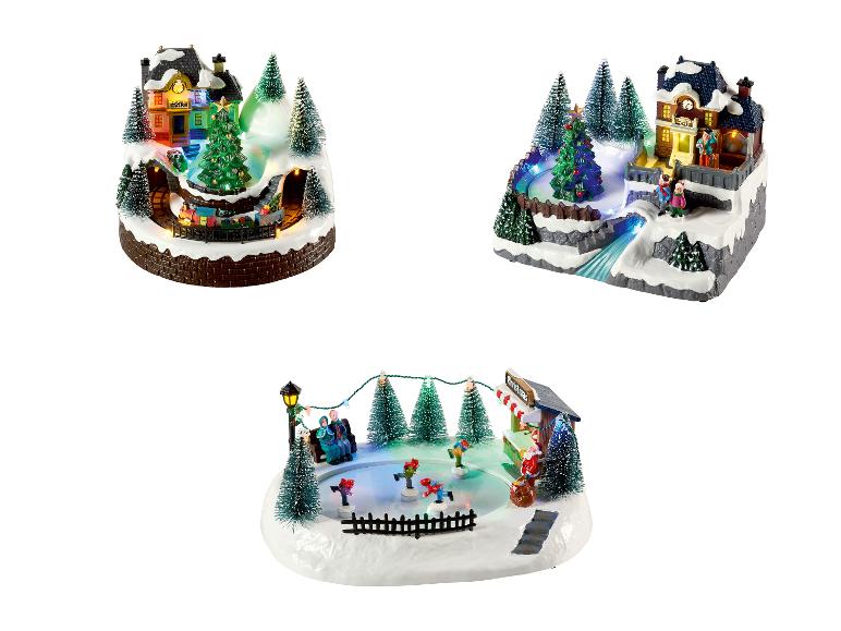 Drei beleuchtete Weihnachtsdorfszenen mit Zug, Eisbahn und Bahnhof.