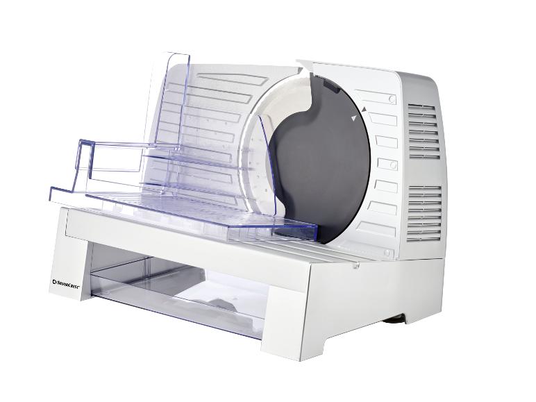 Eine weiße und transparente SilverCrest Aufschnittmaschine mit rotierendem Messer.