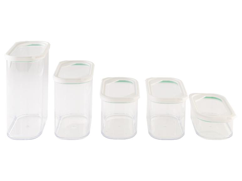 Eine Reihe von transparenten Aufbewahrungsbehältern mit weißen Deckeln.