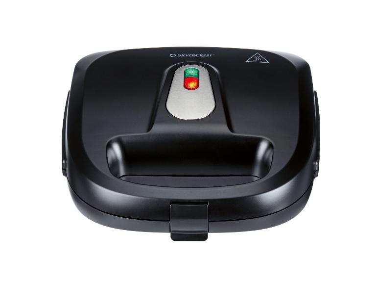 Schwarzes Waffeleisen mit Kontrollleuchten und Griff, Draufsicht.