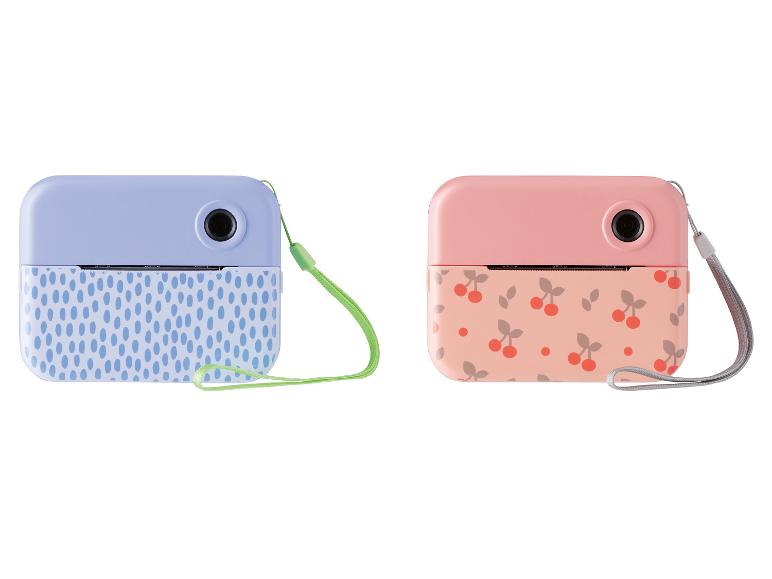 Zwei Kinderkameras, eine blaue mit Punkten und eine rosa mit Kirschen.