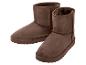 Ein Paar braune Stiefel mit Fellfutter, ideal für den Winter.