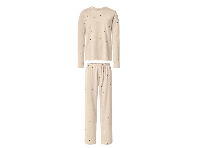 Beiger zweiteiliger Pyjama mit schwarzen Punkten, bestehend aus Langarmshirt und Hose.