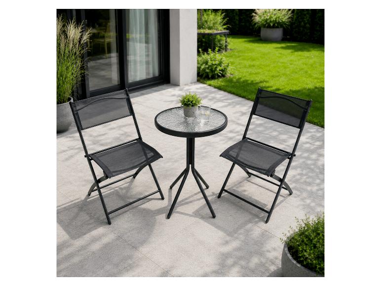 Schwarzes Bistrot-Set mit zwei Klappstühlen und einem runden Tisch auf einer Terrasse.