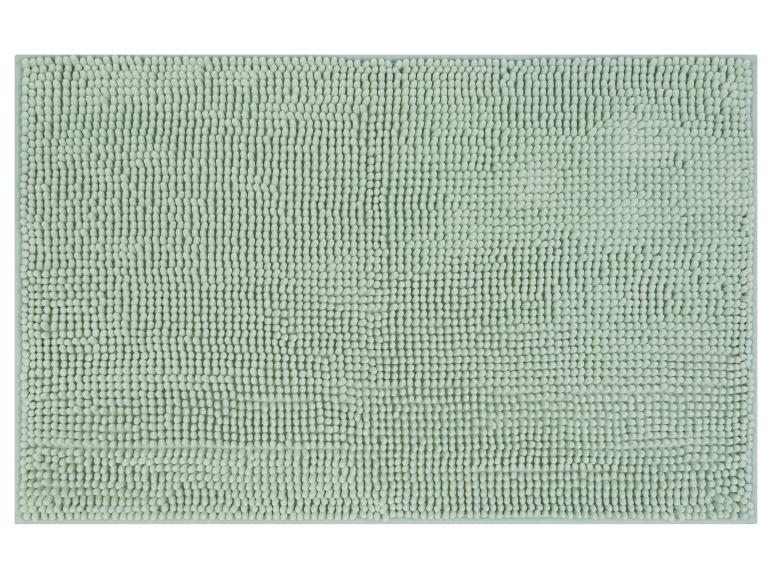 Hellgrüne, weiche Badezimmermatte.