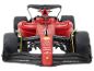 Rotes Spielzeug-Rennauto mit schwarzen Rädern und Frontflügel, Vorderansicht