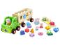 Peppa Pig Holzspielzeug-Set mit LKW, Anhänger und Sortierformen.
