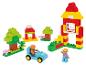 LUPILU® Clippys Junior Bausteinebox mit Figuren, Auto und Haus aus Bausteinen.