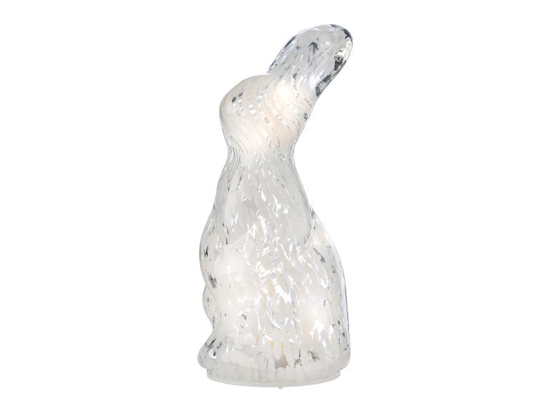 Weiße, glänzende Dekolampe in Hasenform mit spiralförmiger Oberfläche.
