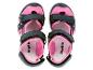 Ein Paar rosa und schwarze Lupilu Sandalen für Kinder.
