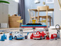 Lego Duplo Spielset mit Autos, Garage und Rennfiguren.