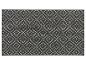 Ein dunkelgrauer Teppich mit einem weißen geometrischen Muster.