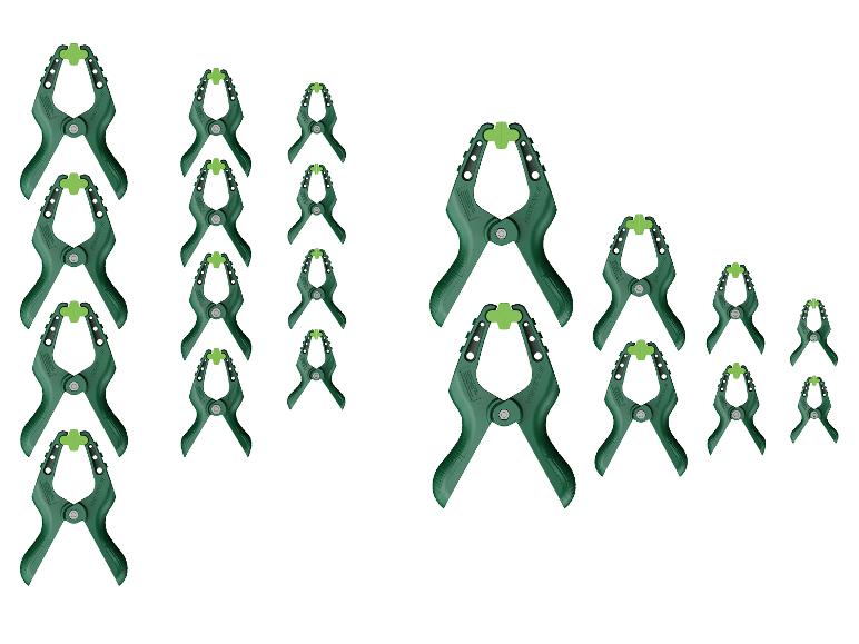 Sortiment grüner Kunststoff-Klemmen Parkslide in verschiedenen Größen.