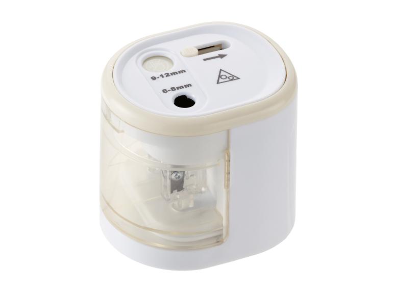 Weißer und beiger elektrischer Bleistiftspitzer mit zwei Schleiflöchern (6-8mm und 9-12mm).