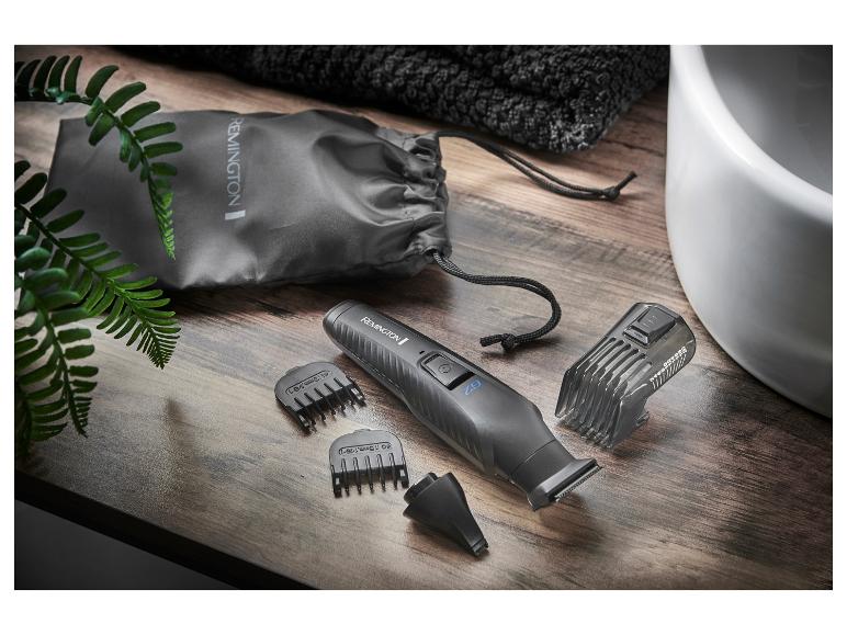Remington-Haarschneider mit Aufsätzen und Etui.