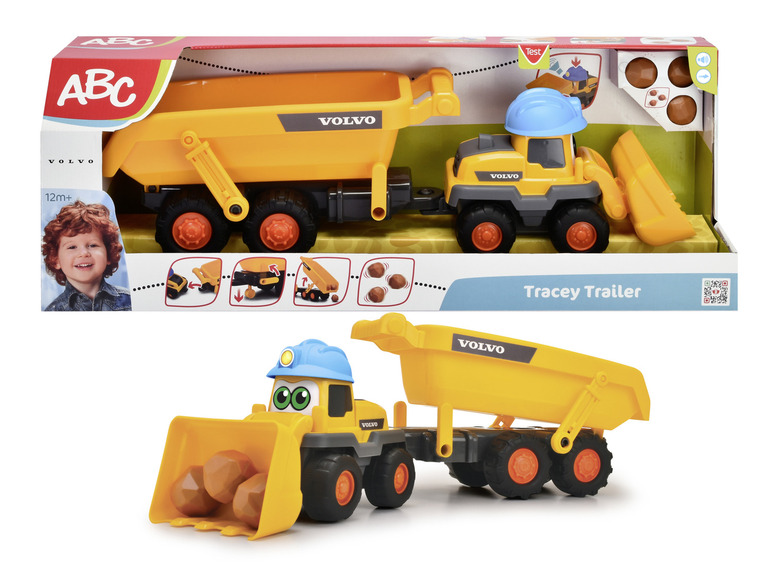 Ein gelber Volvo-Kipper mit Anhänger und Steinen