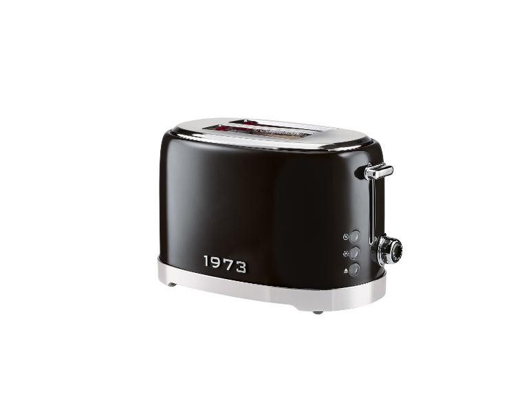 Schwarzer Retro-Toaster mit Chromakzenten und „1973“ auf der Seite.
