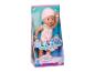 Babypuppe im rosa Badeanzug und Badekappe, mit dem Schriftzug „Lizzie Flamingo Style“ auf der Verpackung.