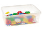 Eine Plastikbox gefüllt mit bunten, zahnradförmigen Spielzeugblöcken.