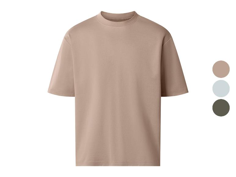Beiges Oversize-T-Shirt mit Rundhalsausschnitt, in drei Farben erhältlich.