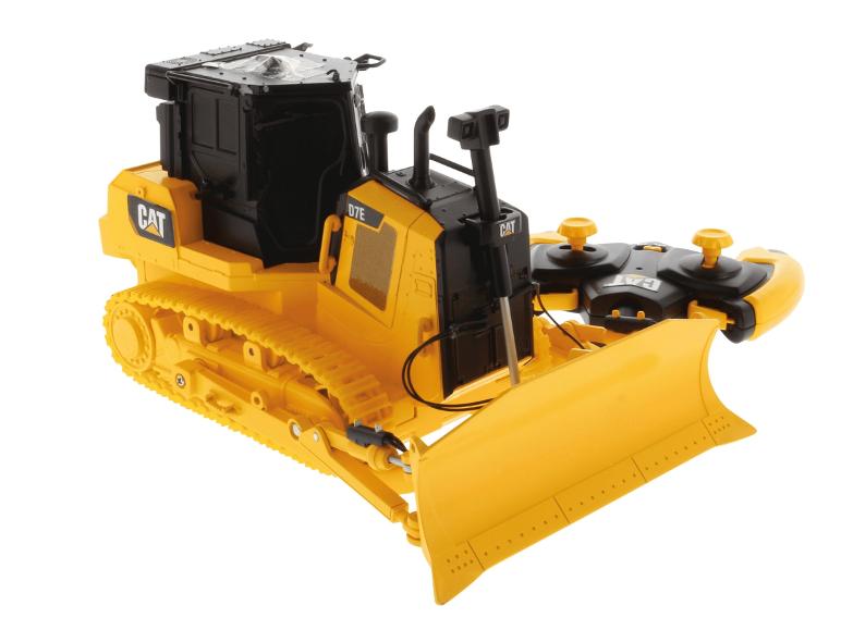 Gelber Caterpillar D7E Spielzeugbagger mit Fernbedienung