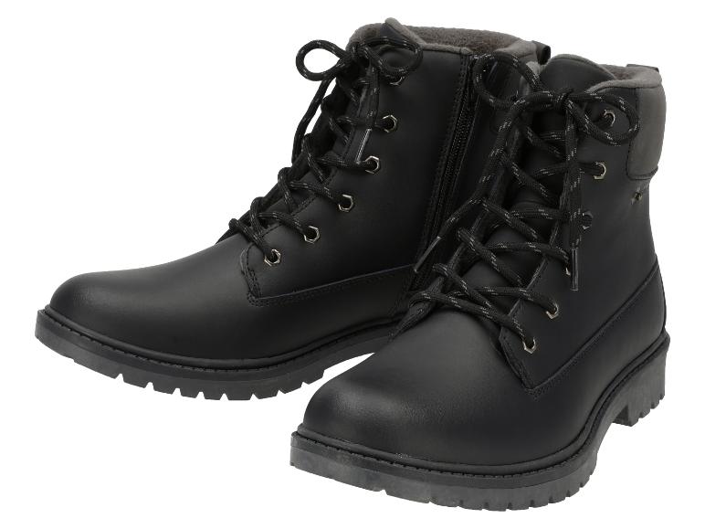 Ein Paar schwarze Schnürstiefel mit Reißverschluss auf weißem Hintergrund.