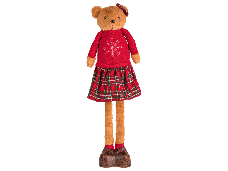 Plüschbär mit rotem Pullover mit Schneeflocke und kariertem Rock.