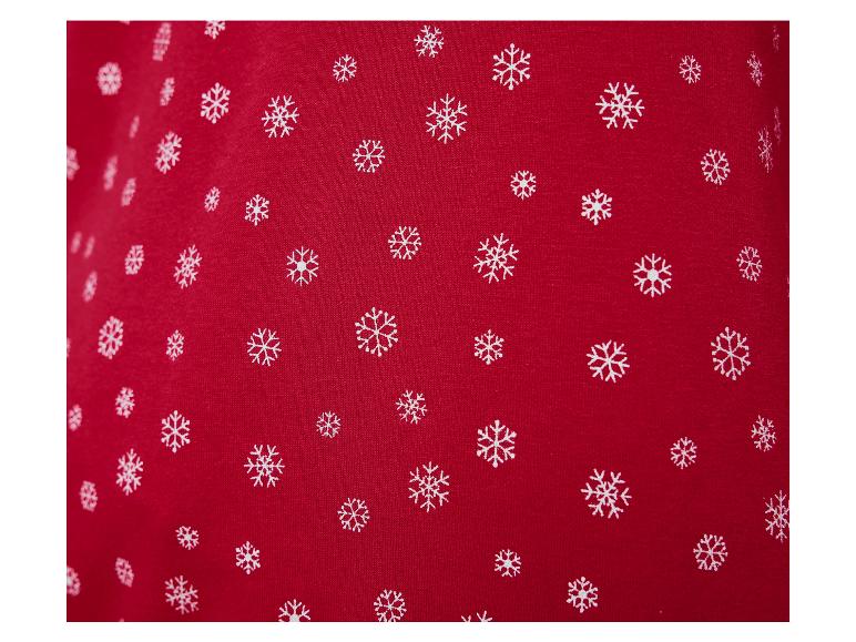 Roter Stoff mit weißen Schneeflocken