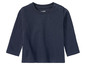 Ein dunkelblaues Langarmshirt für Babys von der Marke Name It.