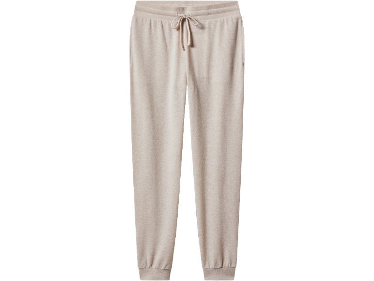 Beige Jogginghose mit Kordelzug in der Taille.