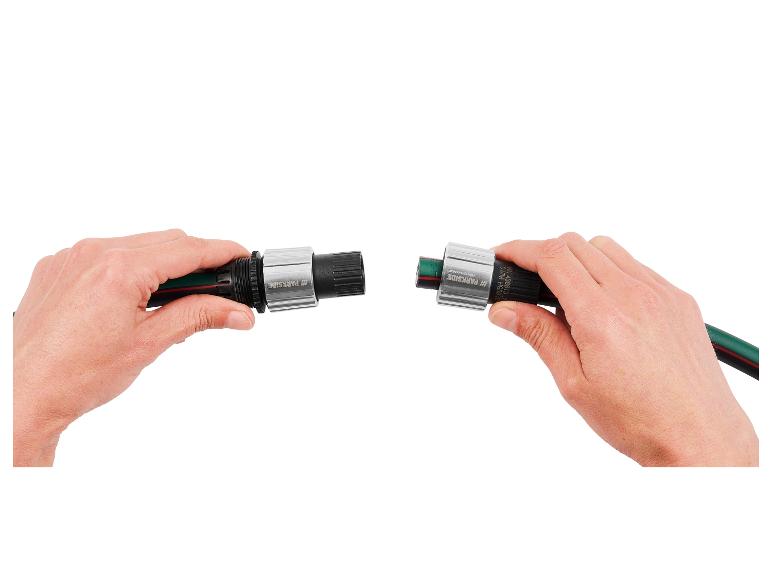 Zwei Parkside Gartenschläuche mit Kupplungen.