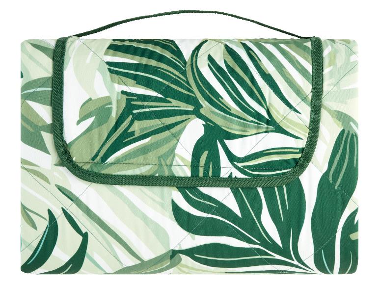 Gepolsterte Picknickdecke mit grünem tropischem Blättermuster.