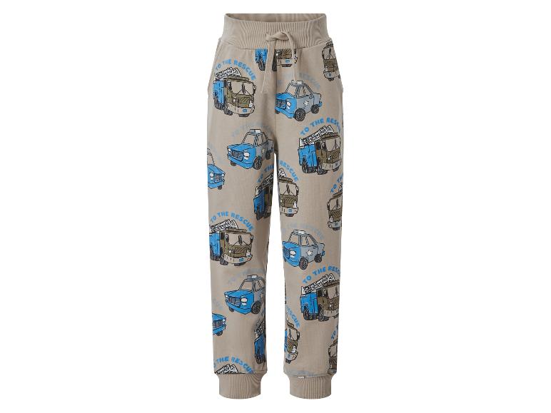 Beige Kinder-Jogginghose mit Rettungsfahrzeug-Print und „TO THE RESCUE“-Schriftzug.
