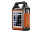 Tragbare orange-schwarze Campinglampe mit Solarpanel, USB-Anschlüssen und Bedienelementen.