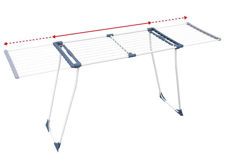 Ausziehbarer Wäscheständer mit blauen Akzenten, mit Pfeil zur Anzeige der verstellbaren Länge.