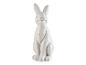 Eine weiße Hasenfigur.