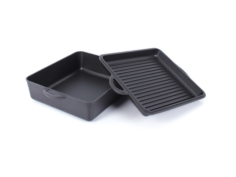 Eine gusseiserne Bratpfanne mit Grillrost.