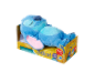 Blaues Plüschtier, das in einem gelben Karton schläft.