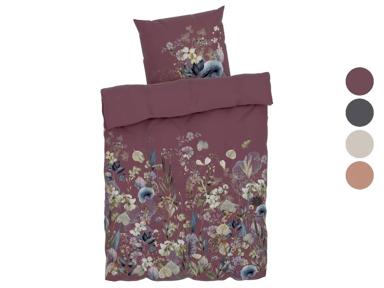 Florales Baumwoll-Bettwäsche-Set mit Bettdecke und Kissen.