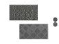 Zwei Teppiche mit geometrischen Mustern in Grau und Schwarz.
