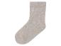 Eine beige Socke mit Rippen.