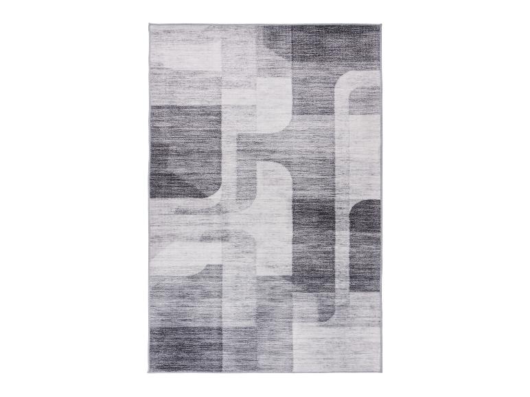 Moderner grau-weißer Teppich mit abstraktem geometrischem Muster.