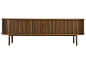Holzsideboard mit Lamellentüren und abgerundeten Kanten auf dünnen Beinen.