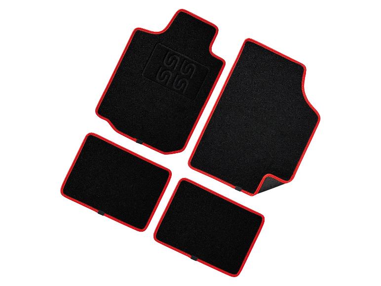 Schwarze Automatten mit roten Kanten.