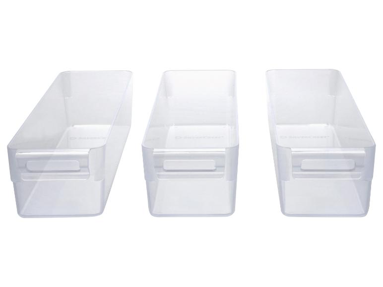 Drei transparente Schubladenorganizer mit Griffen, in einer Reihe angeordnet.
