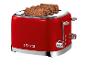 Roter Toaster mit vier Scheiben Körnerbrot, mit der Aufschrift „1973“.