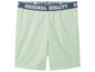 Hellgrüne Shorts mit einem 'Original Quality' Band