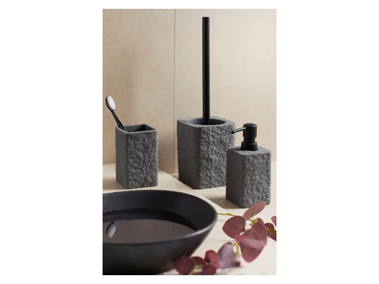 Graues Stein-Badezimmerset mit Seifenspender, Bürstenhalter und Zahnbürstenhalter.